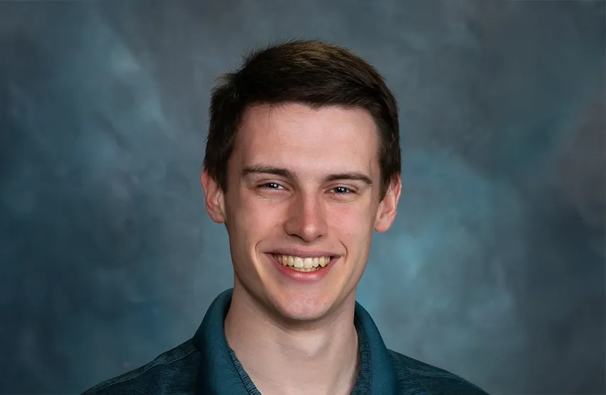 Bryan Hurd smiles at the camera.